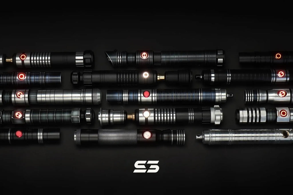 Collection of Star Wars-inspired custom neopixel lightsabers lying side by side