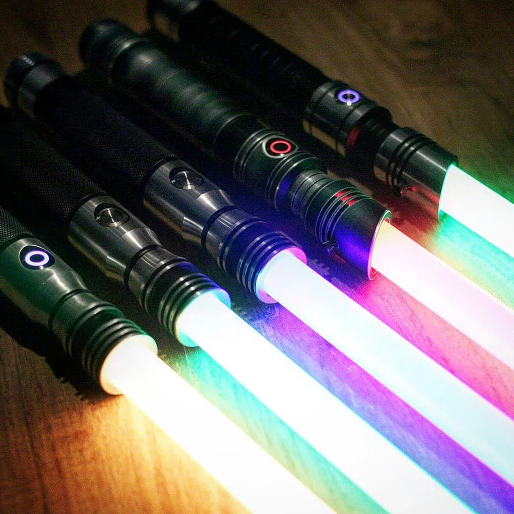 Row of Clone Wars-inspired and Darth Vader-inspired custom neopixel lightsabers in an RGB colors