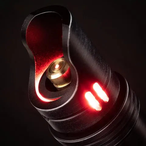 A Rahm Kota-inspired custom neopixel lightsaber features a matte black finish illuminated with a red blade