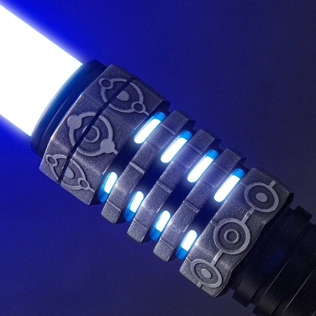Close-up of Star Wars-inspired custom acid-etched neopixel lightsaber features textured finish with circular glyphs mimicking Zeffo ruins