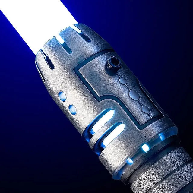 Close-up of a pod racer engine-inspired custom acid-etched neopixel lightsaber features Star Wars: Jedi Fallen Order, and an Alpha Wolf design