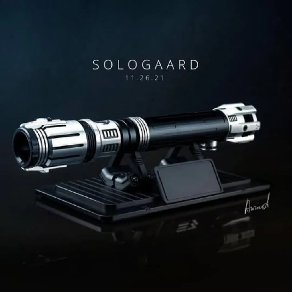 Studio product shot of a Ben Solo-inspired custom neopixel lightsaber on a display stand features black and silver finish with widowed emitter