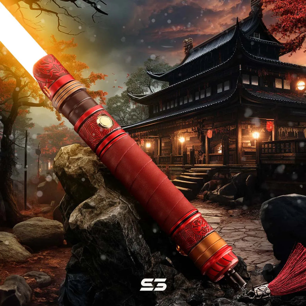 Rahm Kota custom neopixel lightsaber inspired by Japanese folklore of Red Demon with maroon leather wrap, Namahage mask etching, and orange blade