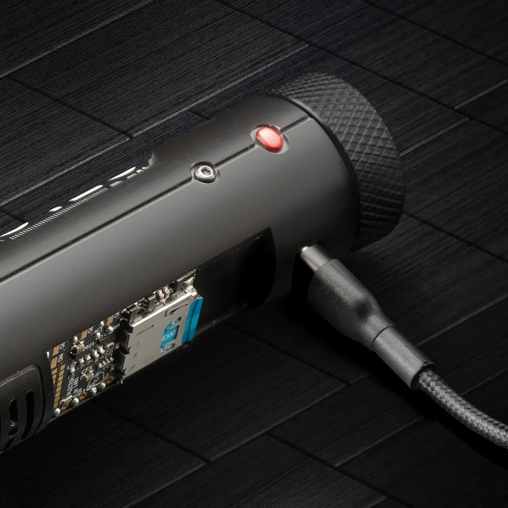 Advanced fully modular Power Core chassis for custom neopixel lightsabers featuring a connected USB-C cable and illuminated red status LED