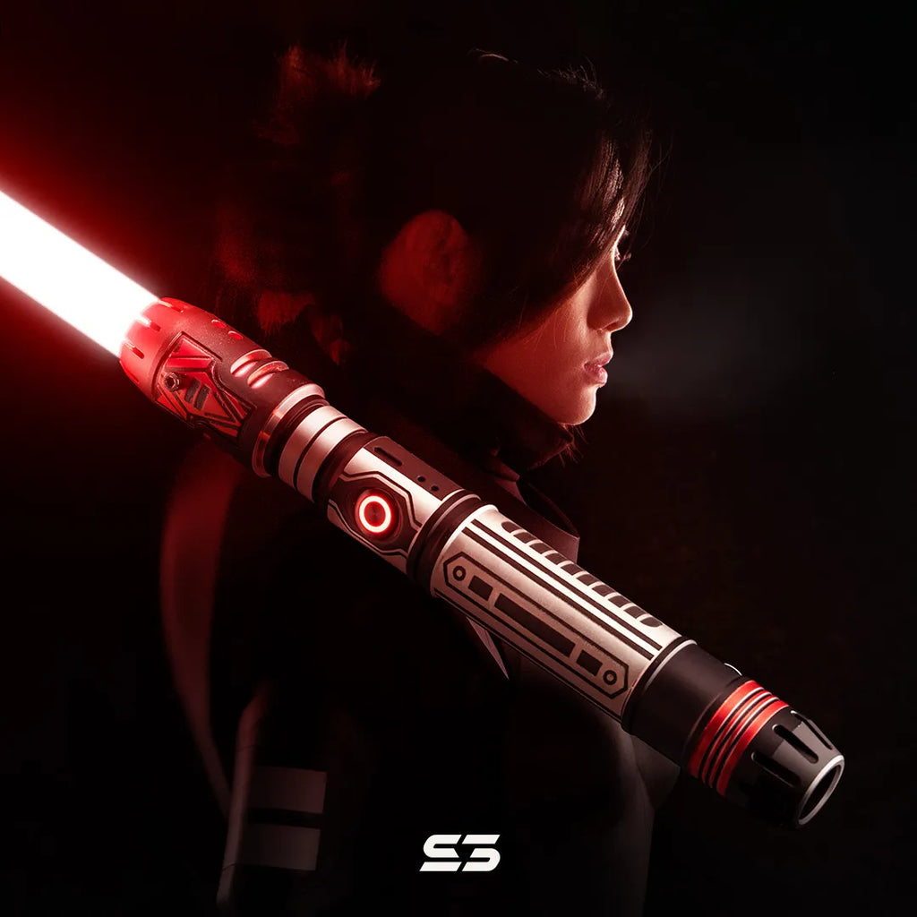 Female Sith Inquisitor cosplayer with pod racer engine-inspired custom neopixel red lightsaber features black and white acid-etched