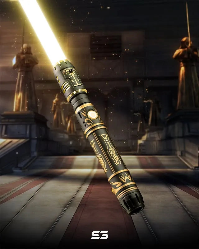 Pod racer engine-inspired custom neopixel lightsaber features black finish with gold accents, Jedi temple ceremonial motifs, yellow blade